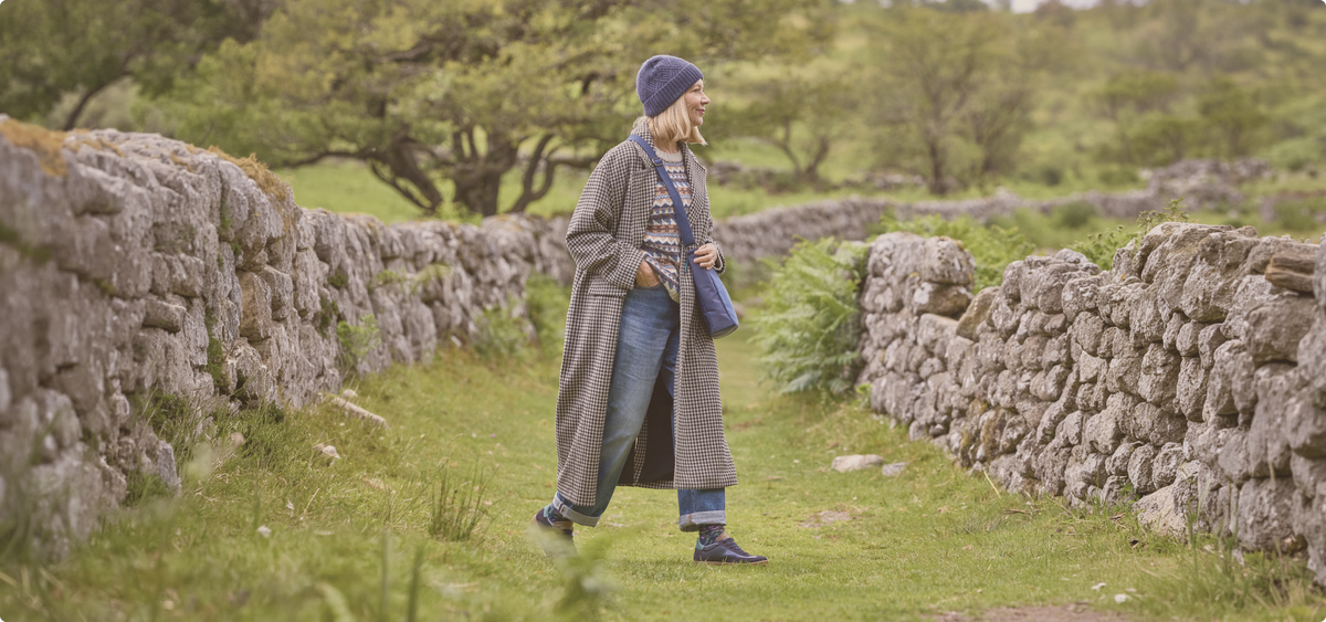lady walking through moors
